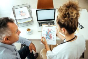 doctor looking at diagram
