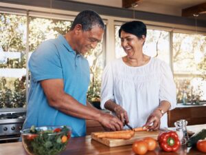 man and woman cooking